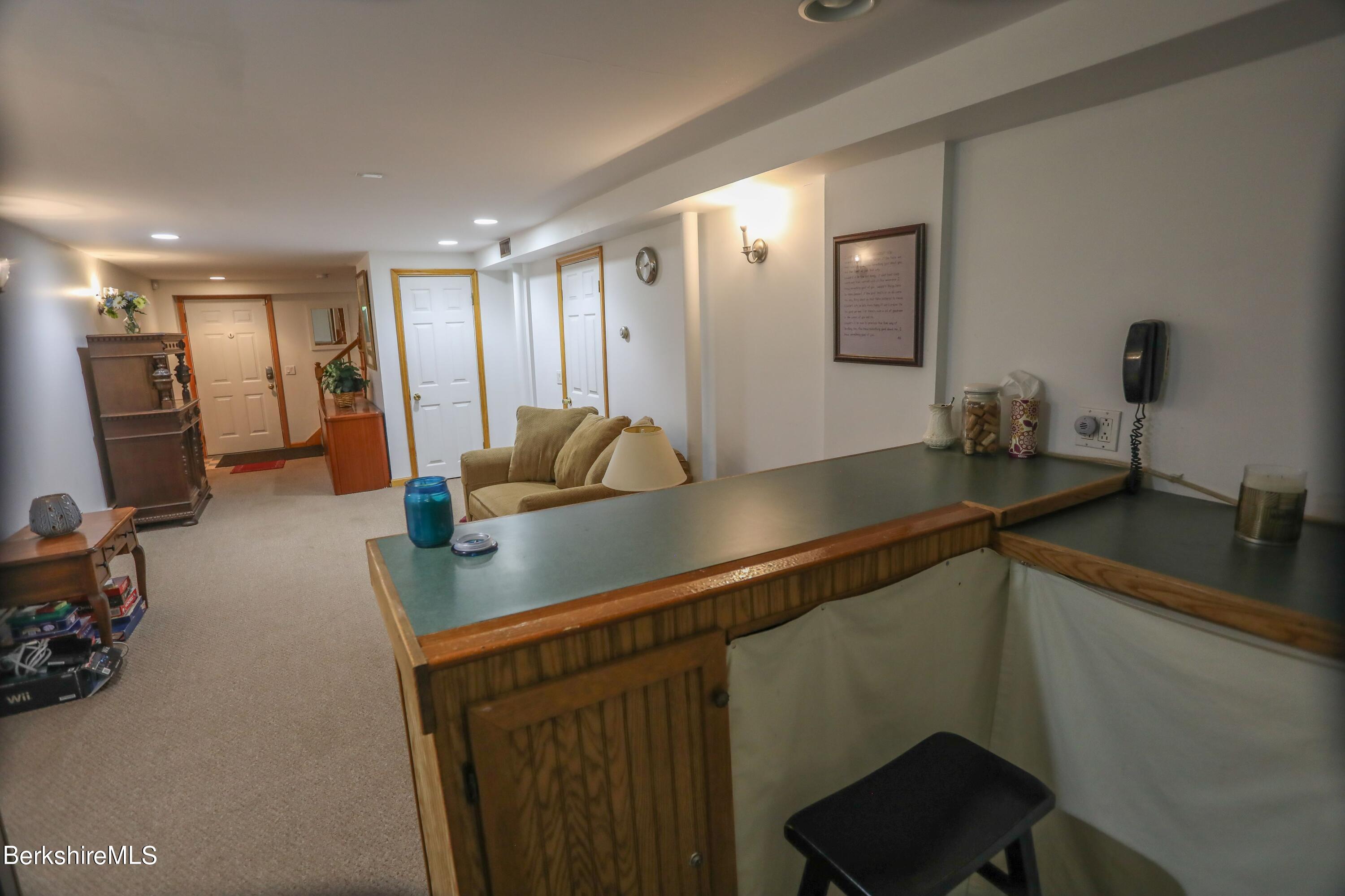 792 Middle Road Clarksburg, MA 01247 - Photo 30 of 40 a kitchen with stainless steel appliances a sink stove and cabinets
