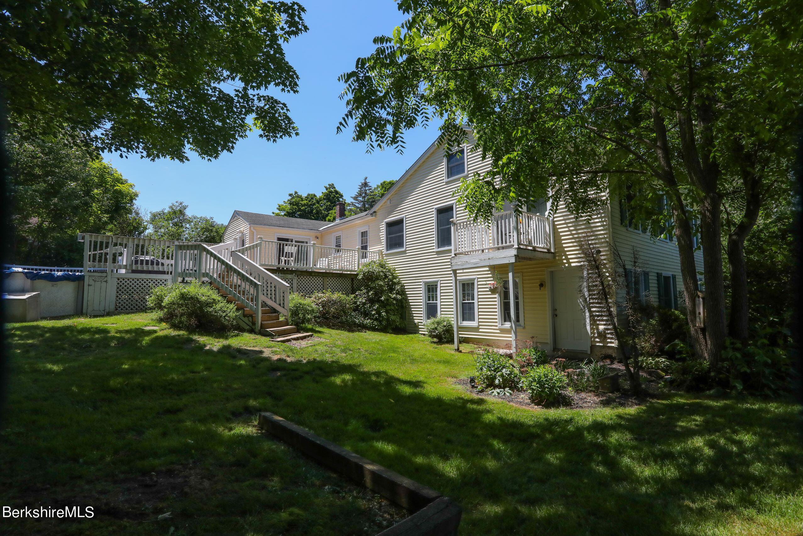 792 Middle Road Clarksburg, MA 01247 - Photo 3 of 40 a front view of a house with a yard