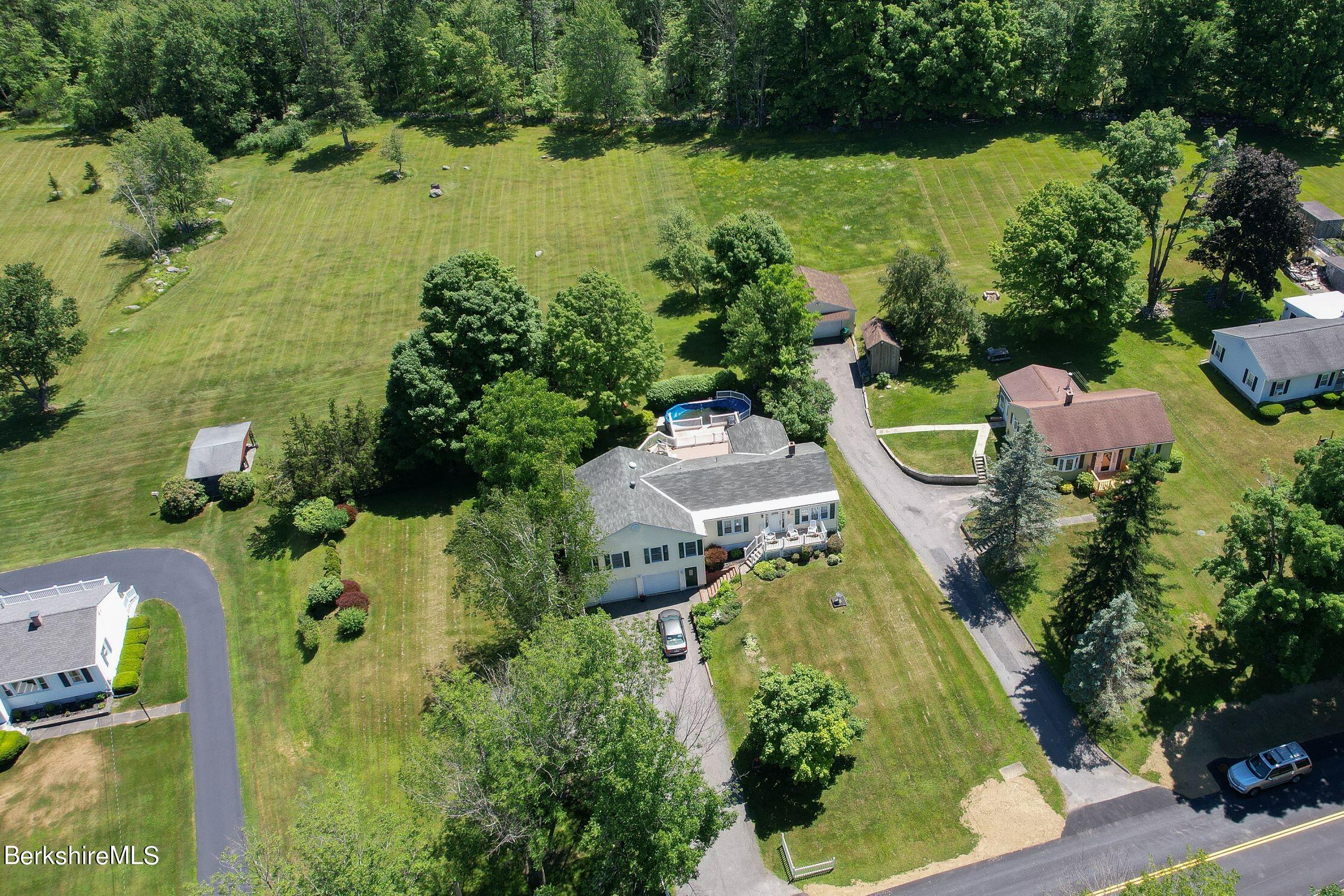 792 Middle Road Clarksburg, MA 01247 - Photo 40 of 40 an aerial view of a house with a yard and lake view