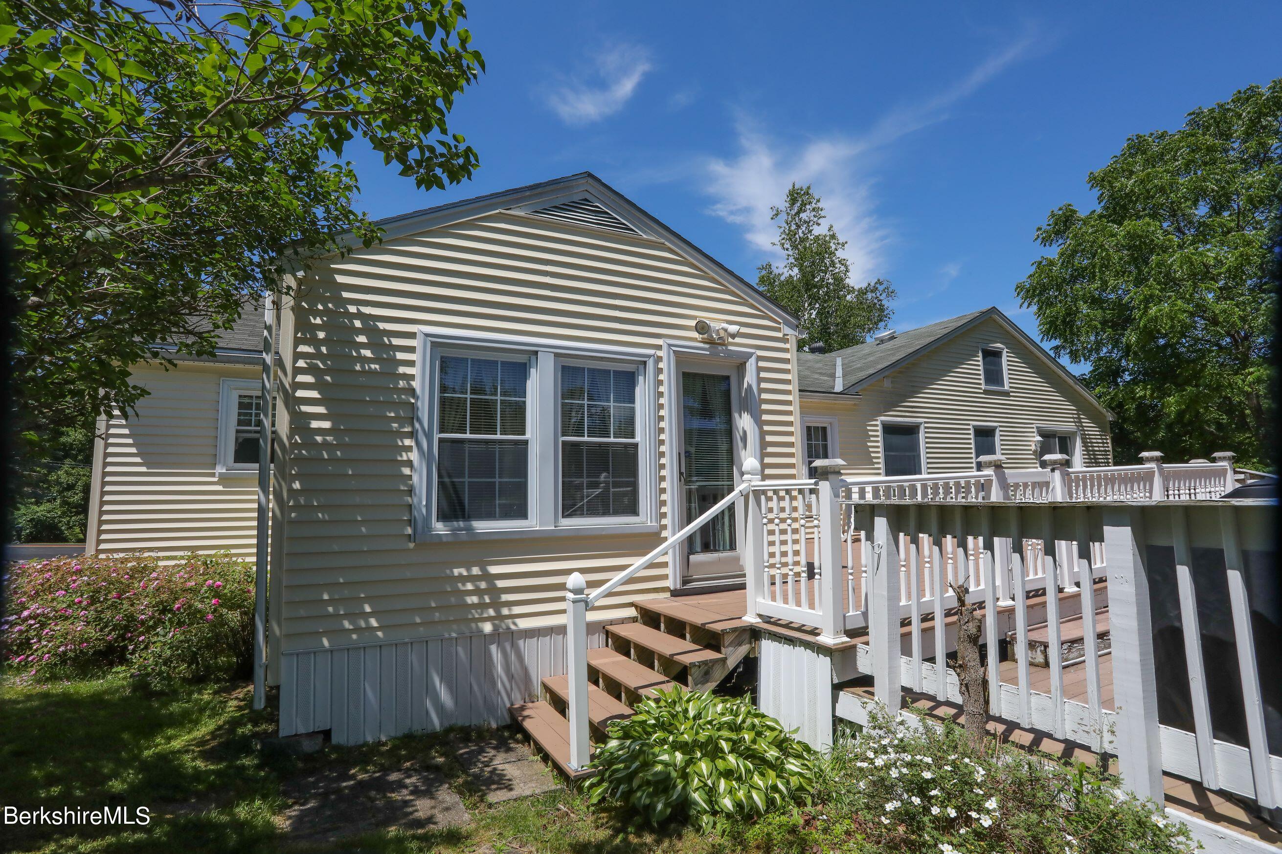 792 Middle Road Clarksburg, MA 01247 - Photo 5 of 40 a front view of a house with a yard