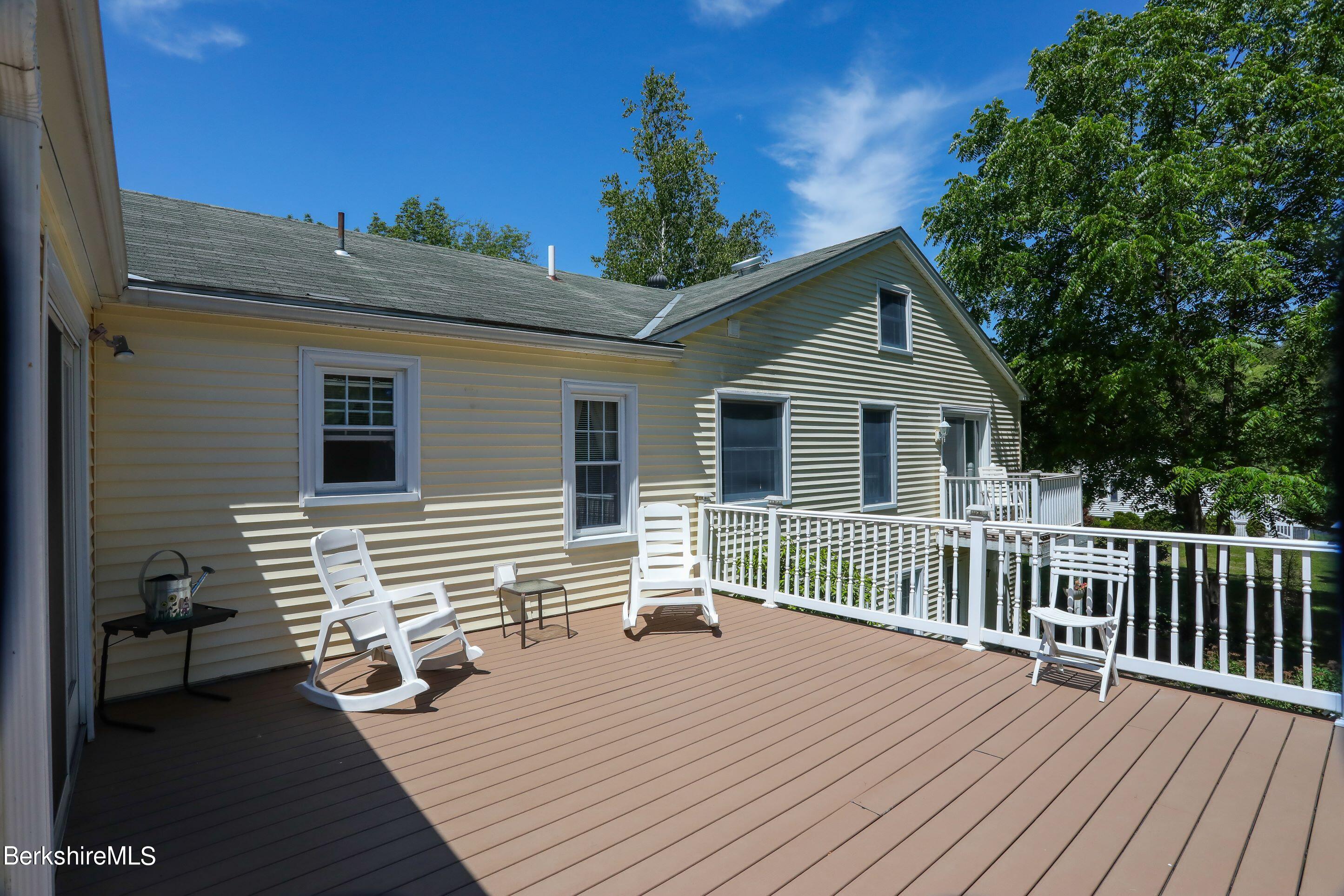 792 Middle Road Clarksburg, MA 01247 - Photo 6 of 40 a deck view with a seating space