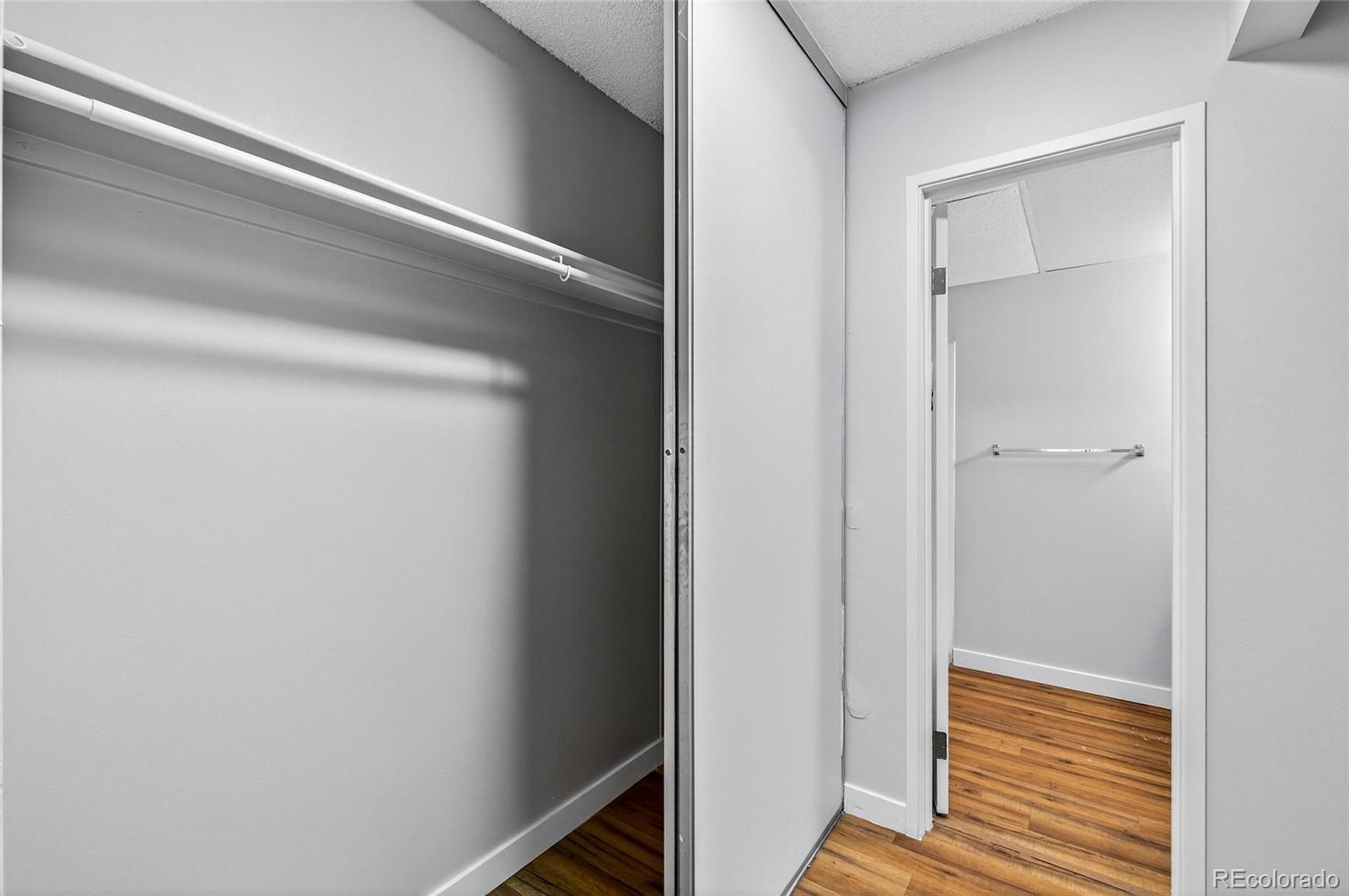 2281 South Vaughn Way Aurora, CO 80014 - Photo 18 of 23 a view of a hallway