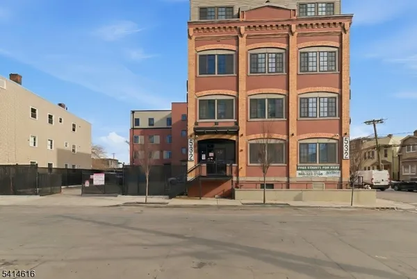 a front view of a building with street