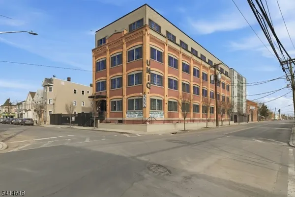a view of a building with a street