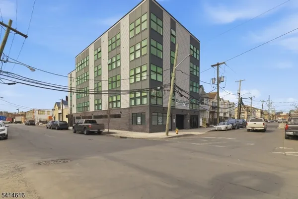 a view of a street with cars