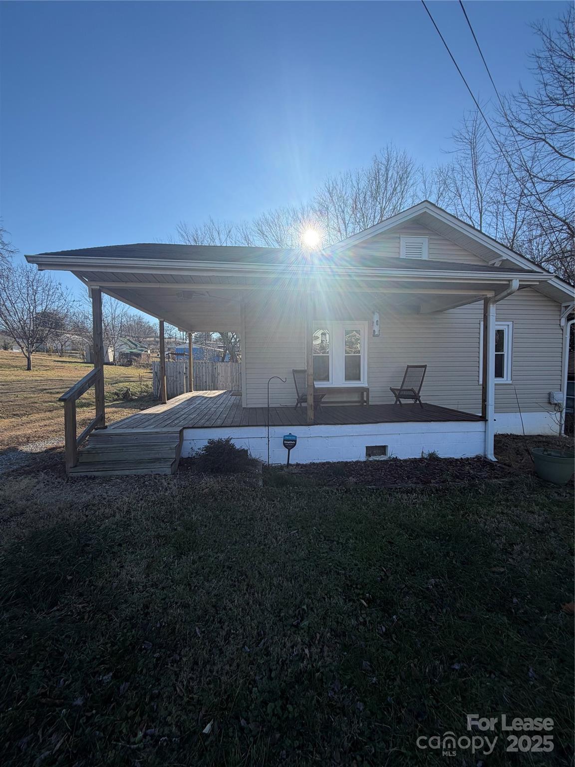 31 Carolina Avenue Marion, NC 28752 - Photo 4 of 11 a backyard of a house with table and chairs