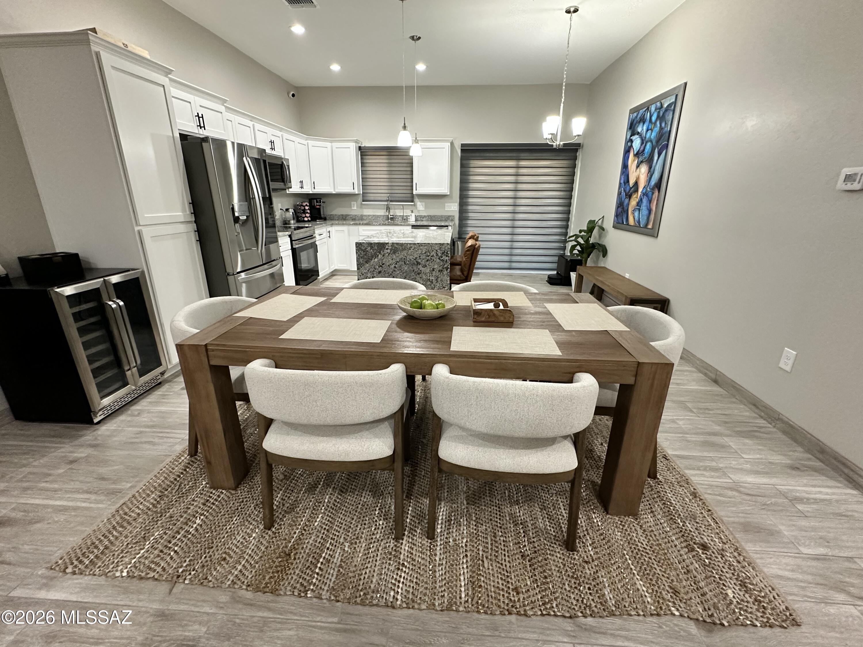117 Ver Patria Rio Rico, AZ 85648 - Photo 7 of 28 a view of a dining room with furniture
