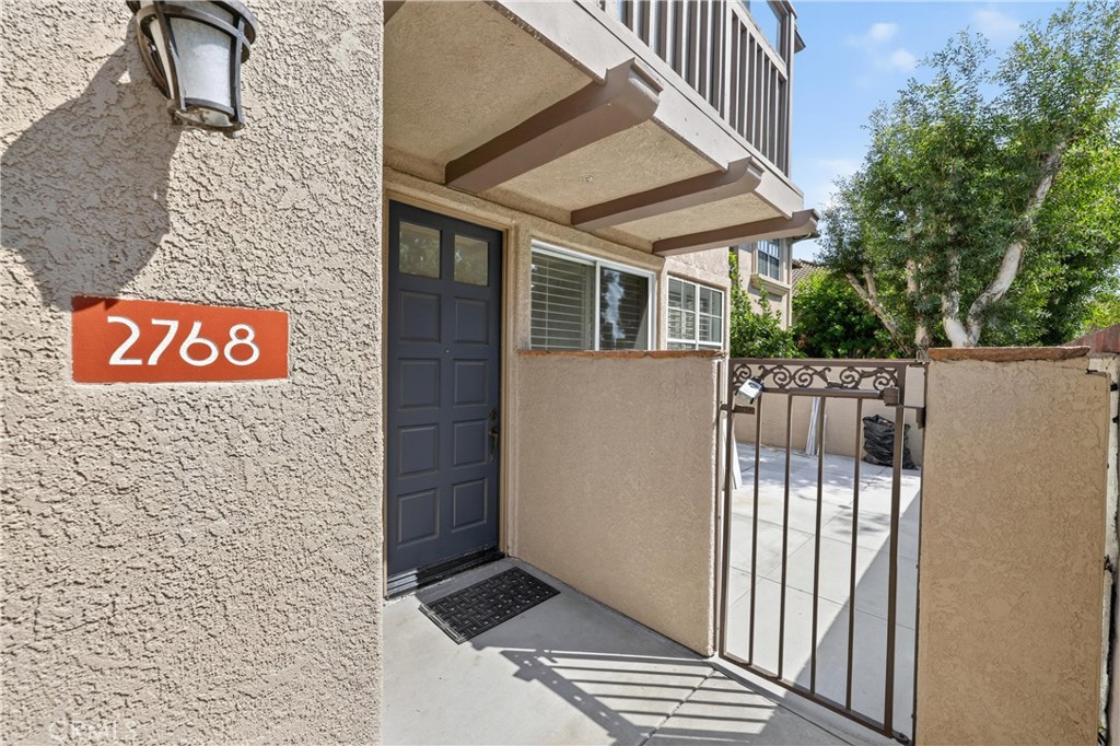 2768 Monza Tustin, CA 92782 - Photo 1 of 2 a view of a wooden door
