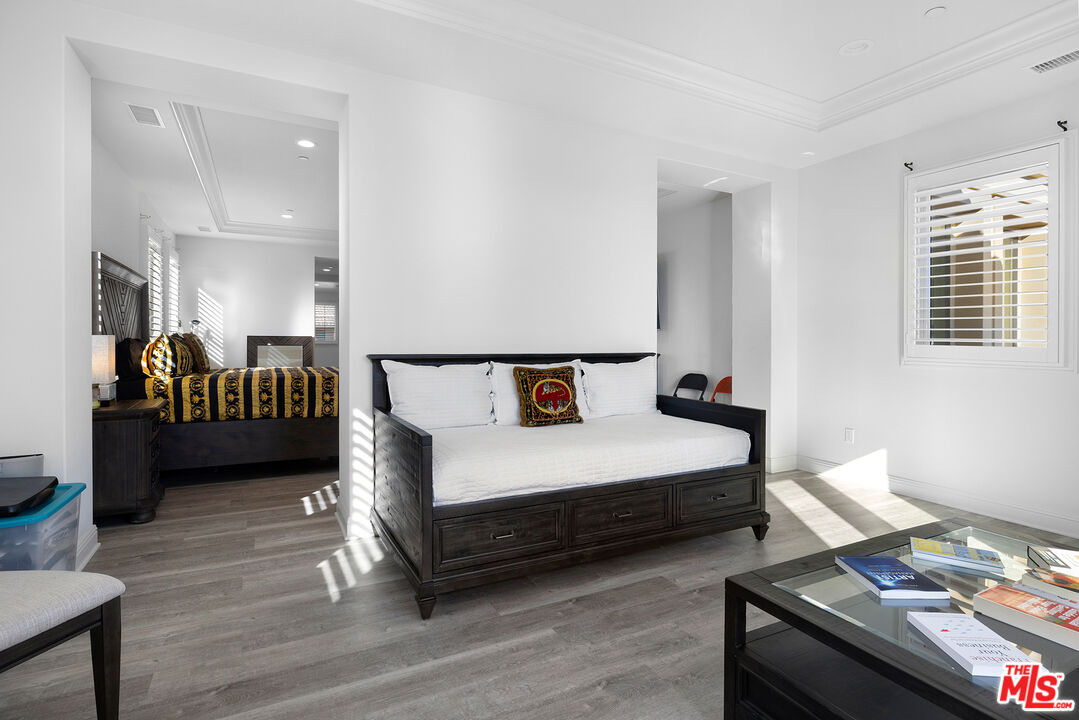 20234 Jubilee Way Porter Ranch, CA 91326 - Photo 22 of 30 a bedroom with bed and window