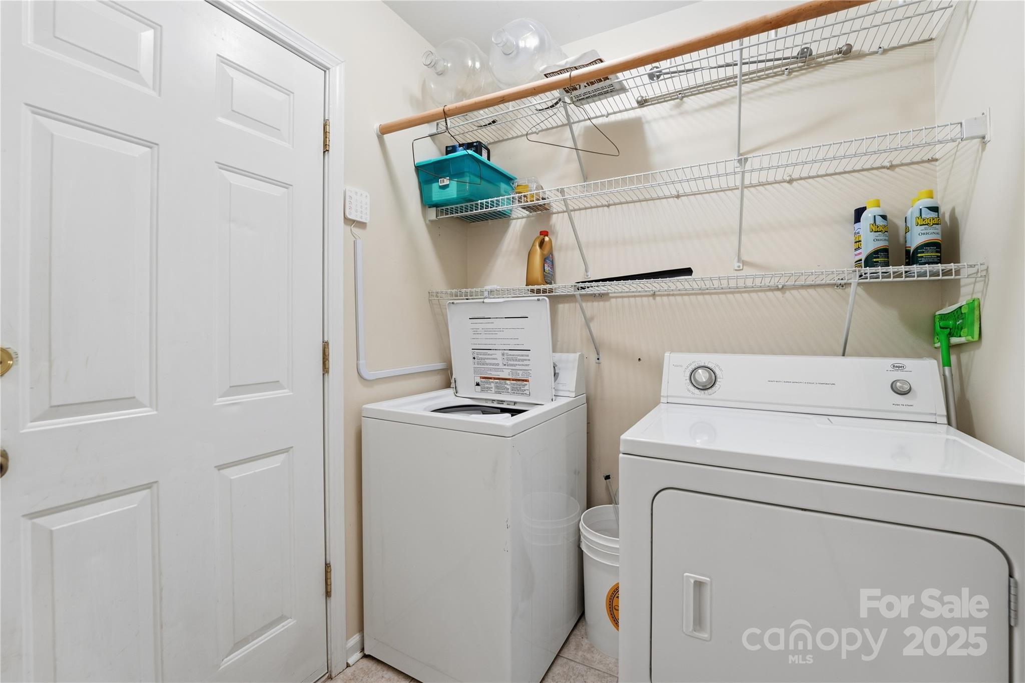5822 Meeting Street Concord, NC 28025 - Photo 7 of 21 a utility room with dryer and washer