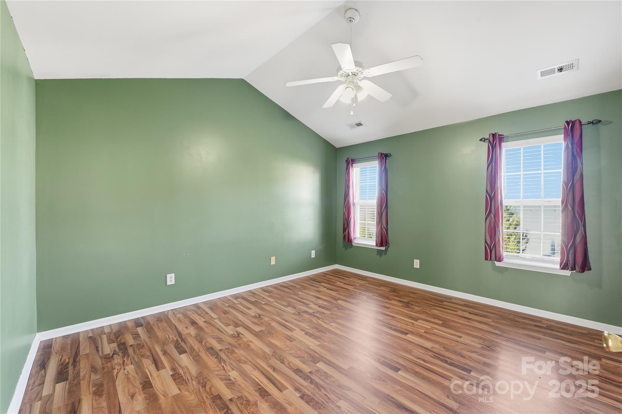 5822 Meeting Street Concord, NC 28025 - Photo 10 of 21 a view of a room with a ceiling fan and a window