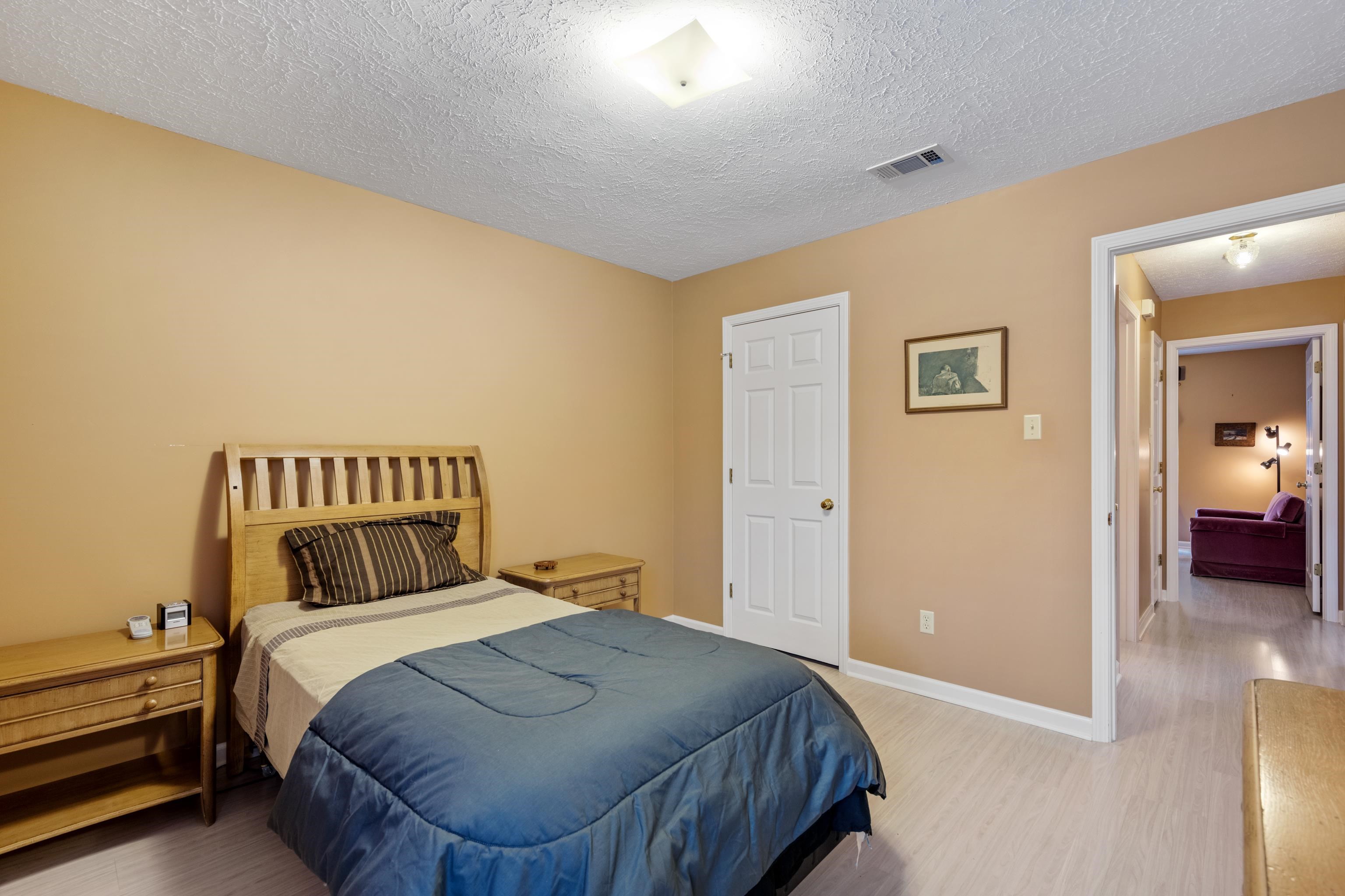 811 Vaughn Road Memphis, TN 38122 - Photo 24 of 33 a bedroom with a bed and a view of bedroom