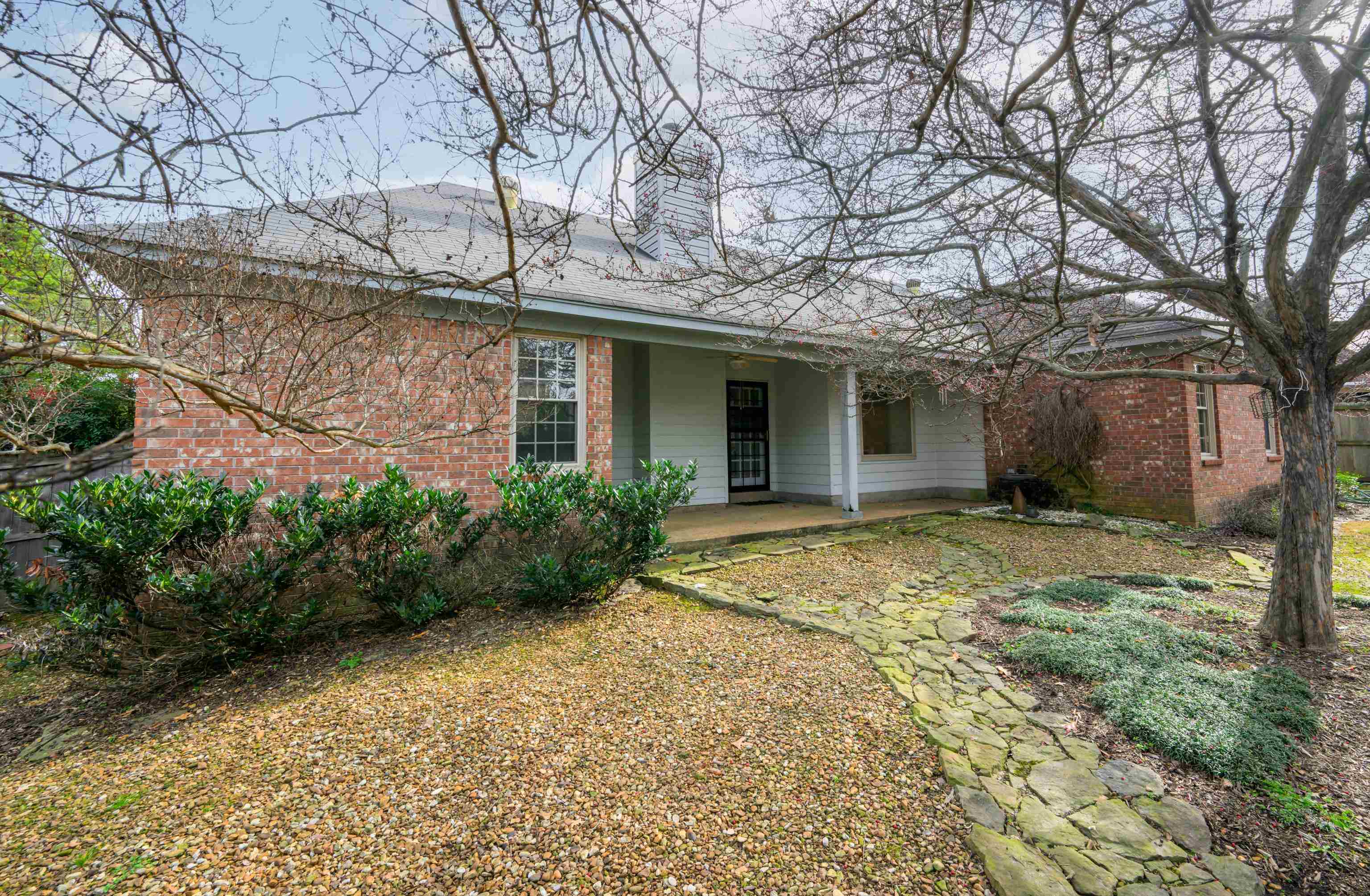 811 Vaughn Road Memphis, TN 38122 - Photo 26 of 33 a view of a house with a yard and potted plants
