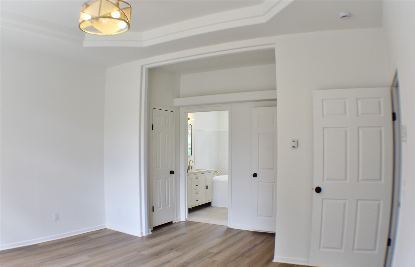 2095 Mullenville Road Fairplay, CO 80440 - Photo 9 of 22 a view of an empty room with wooden floor and a window