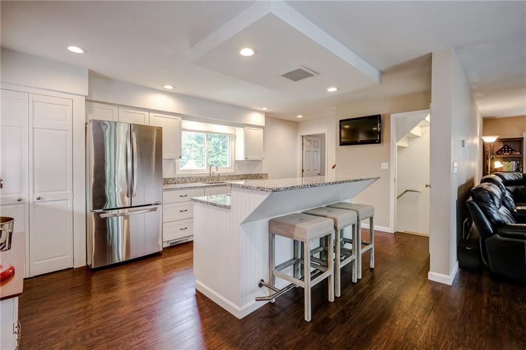 7100 Saltsburg Road Pittsburgh, PA 15235 - Photo 7 of 23 Kitchen that opens out to dining room and family room with a great breakfast bar