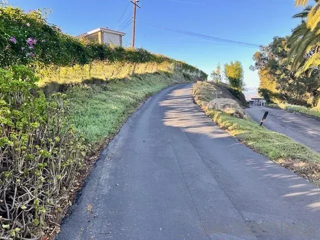 a view of a livingroom with workspace and a couch