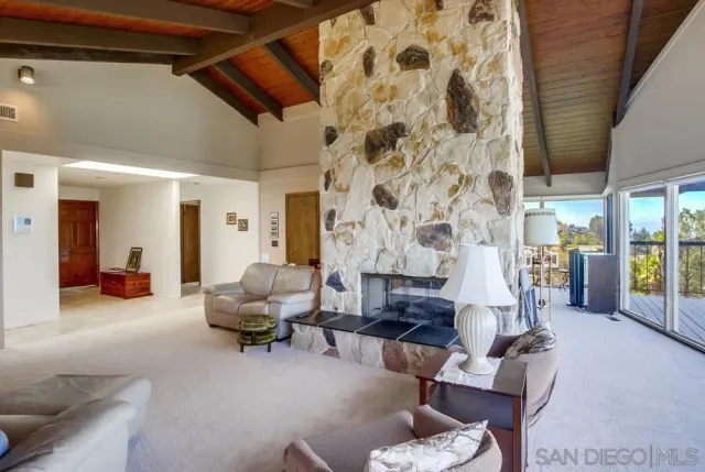 a kitchen with a large window and a counter space