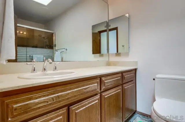 a view of a city with flower garden