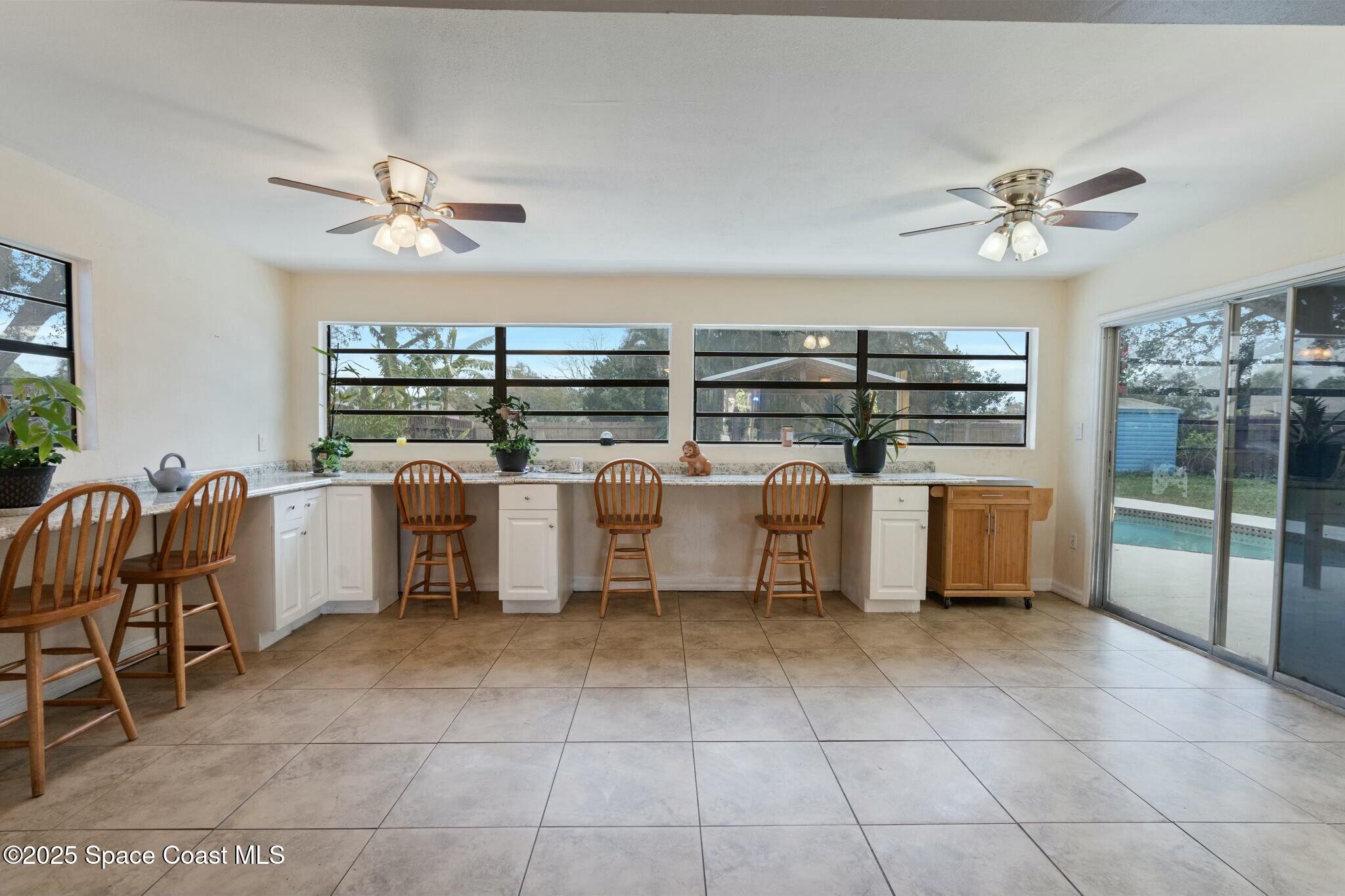 1550 Creel Road Northeast Palm Bay, FL 32905 - Photo 8 of 27 a kitchen with lots of counter top space