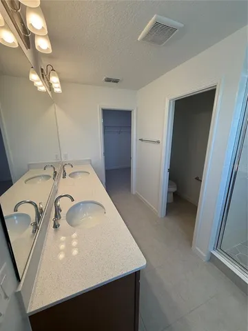 a view of kitchen island with tub and wooden floor