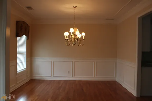 a view of a chandelier in a room