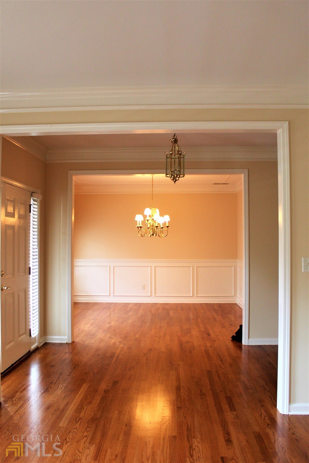 149 Walnut Ridge Drive Hoschton, GA 30548 - Photo 19 of 19 a view of empty room with wooden floor