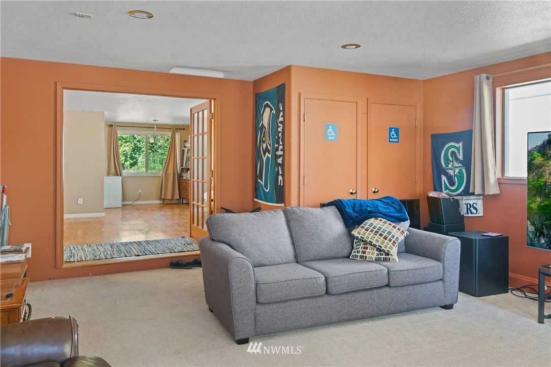 4117 212th Street Southeast Bothell, WA 98021 - Photo 14 of 32 a living room with furniture and a window