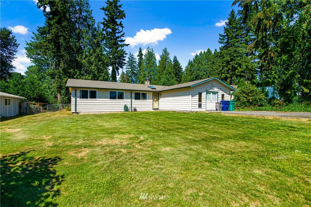4117 212th Street Southeast Bothell, WA 98021 - Photo 21 of 32 a view of house with garden