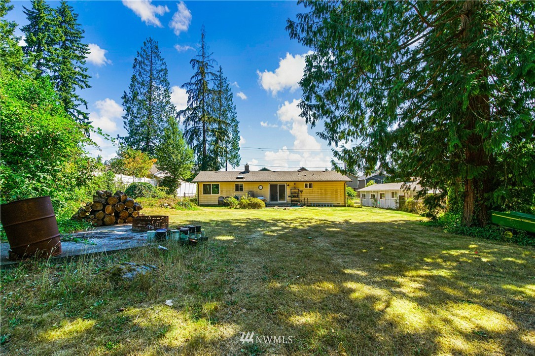 4117 212th Street Southeast Bothell, WA 98021 - Photo 27 of 32 a view of a house with a yard