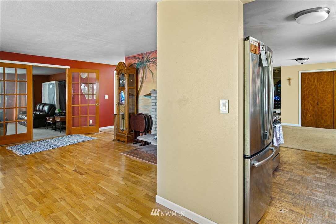 4117 212th Street Southeast Bothell, WA 98021 - Photo 8 of 32 a view of a hallway with a furniture