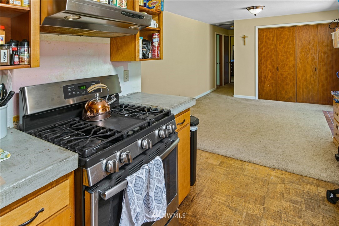 4117 212th Street Southeast Bothell, WA 98021 - Photo 10 of 32 a kitchen stove sitting inside of a kitchen