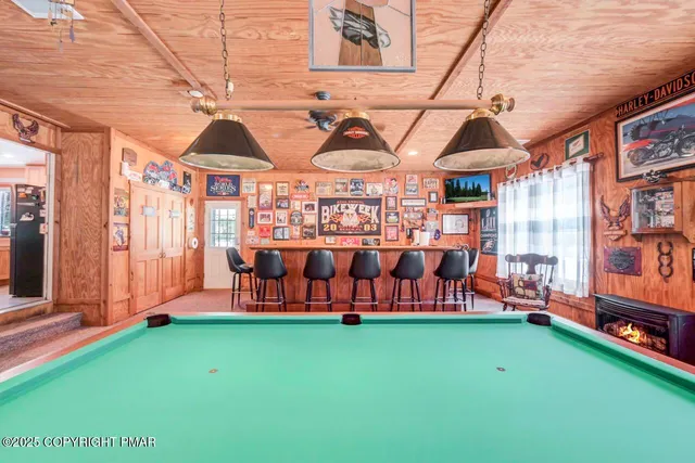 a room with lots of furniture and windows