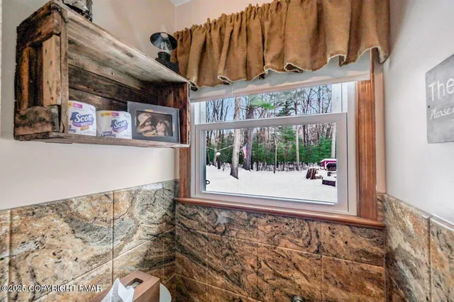 a view of an empty room with stairs