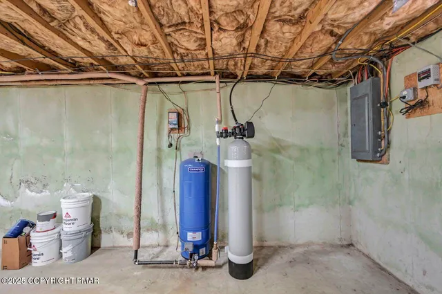 a view of an outdoor space with red brick wall