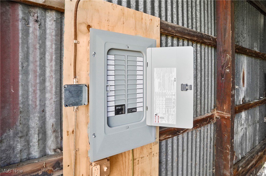 8825 Tallmadge Road Diamond, OH 44412 - Photo 33 of 33 New breaker box in outbuilding