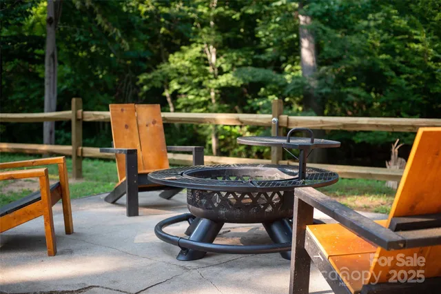 a view of an outdoor sitting area with furniture