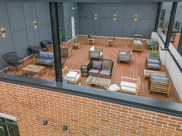 a view of a living room with furniture