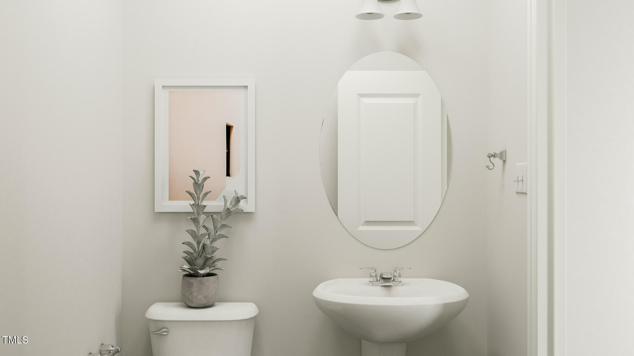 510 Light Oak Way Apex, NC 27539 - Photo 6 of 37 a bathroom with a toilet sink and mirror