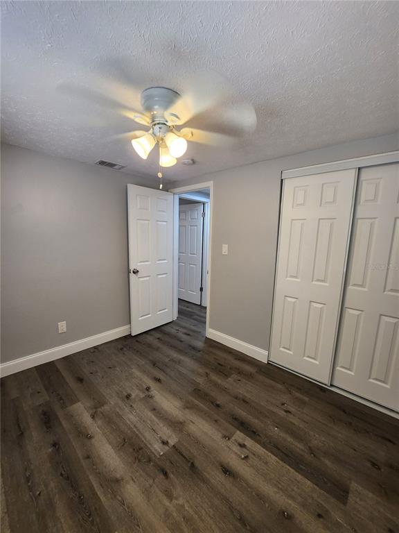 8012 Emi Ann Lane Riverview, FL 33578 - Photo 12 of 16 wooden floor in an empty room
