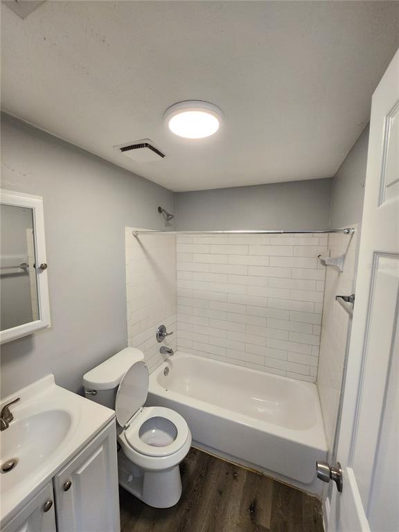 8012 Emi Ann Lane Riverview, FL 33578 - Photo 14 of 16 a bathroom with a sink a toilet and a bathtub