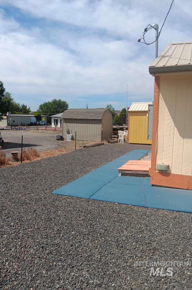 269 South State Street Hagerman, ID 83332 - Photo 7 of 29 View of yard with a storage unit