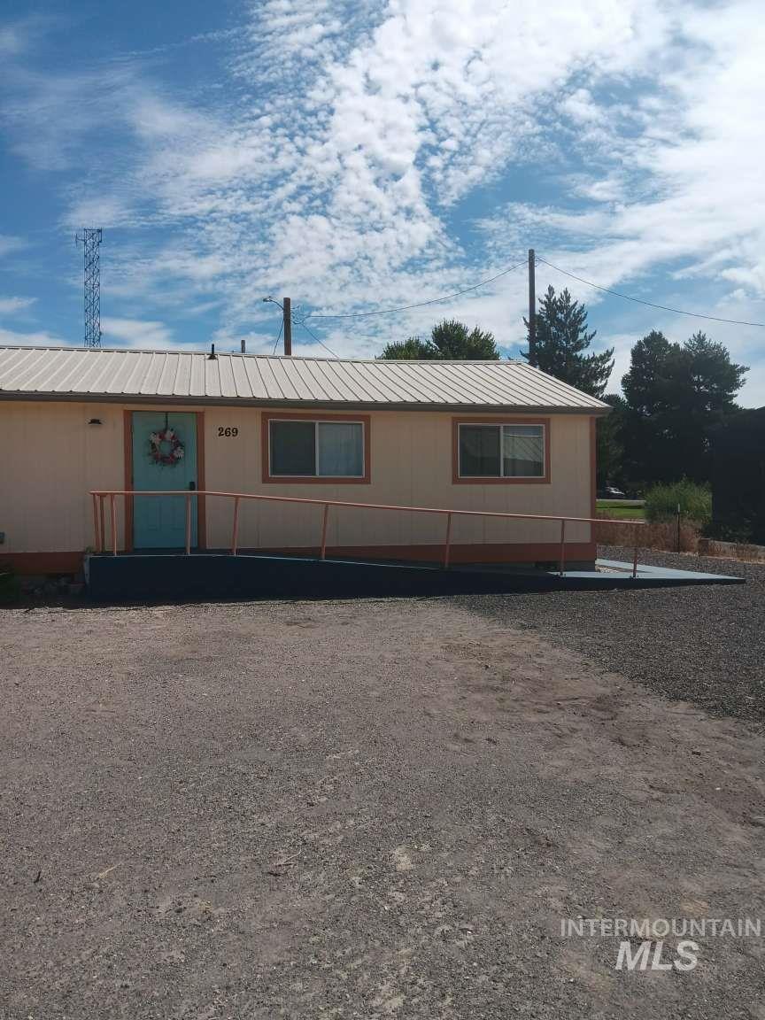 269 South State Street Hagerman, ID 83332 - Photo 8 of 29 View of front of property with a metal roof