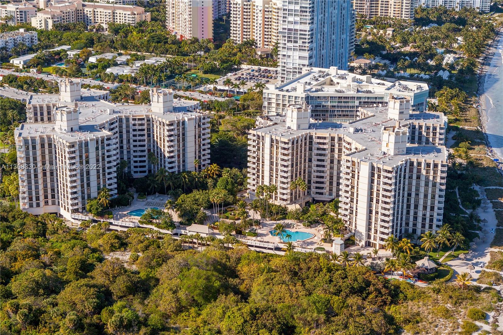 1121 Crandon Boulevard, Unit E1101 Key Biscayne, FL 33149 - Photo 28 of 31 a view of a street with plants