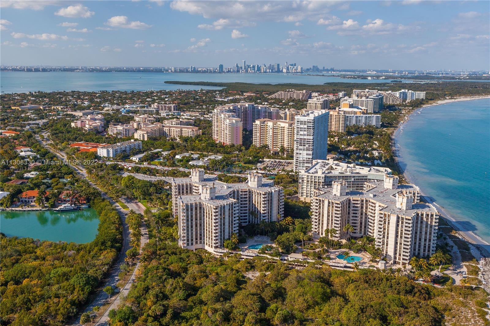 1121 Crandon Boulevard, Unit E1101 Key Biscayne, FL 33149 - Photo 29 of 31 a view of a city with tall buildings