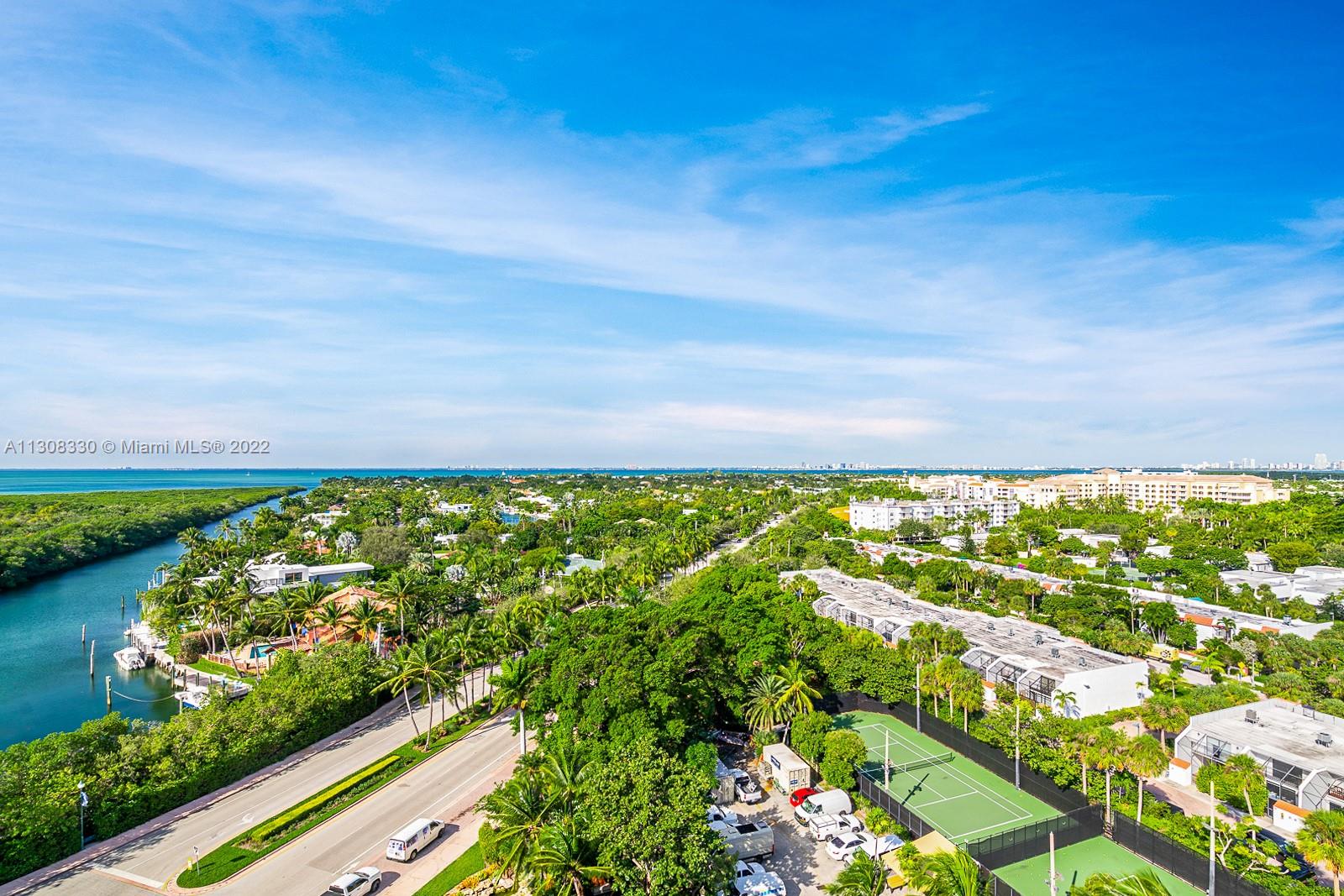 1121 Crandon Boulevard, Unit E1101 Key Biscayne, FL 33149 - Photo 3 of 31 a view of a garden