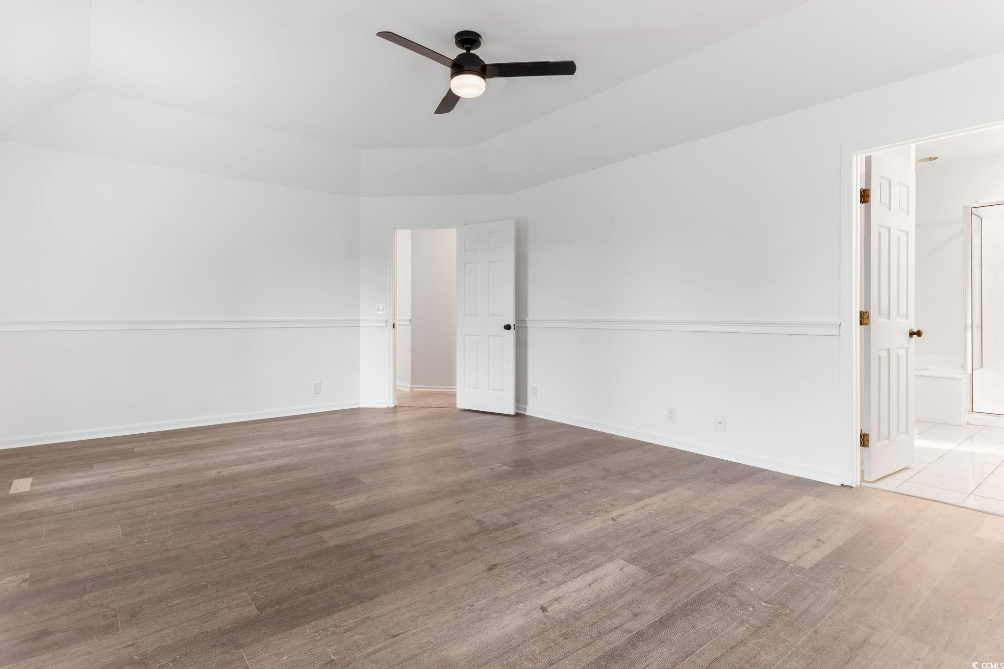 2321 Brick Drive Longs, SC 29568 - Photo 22 of 40 Spare room featuring wood finished floors and ceiling fan