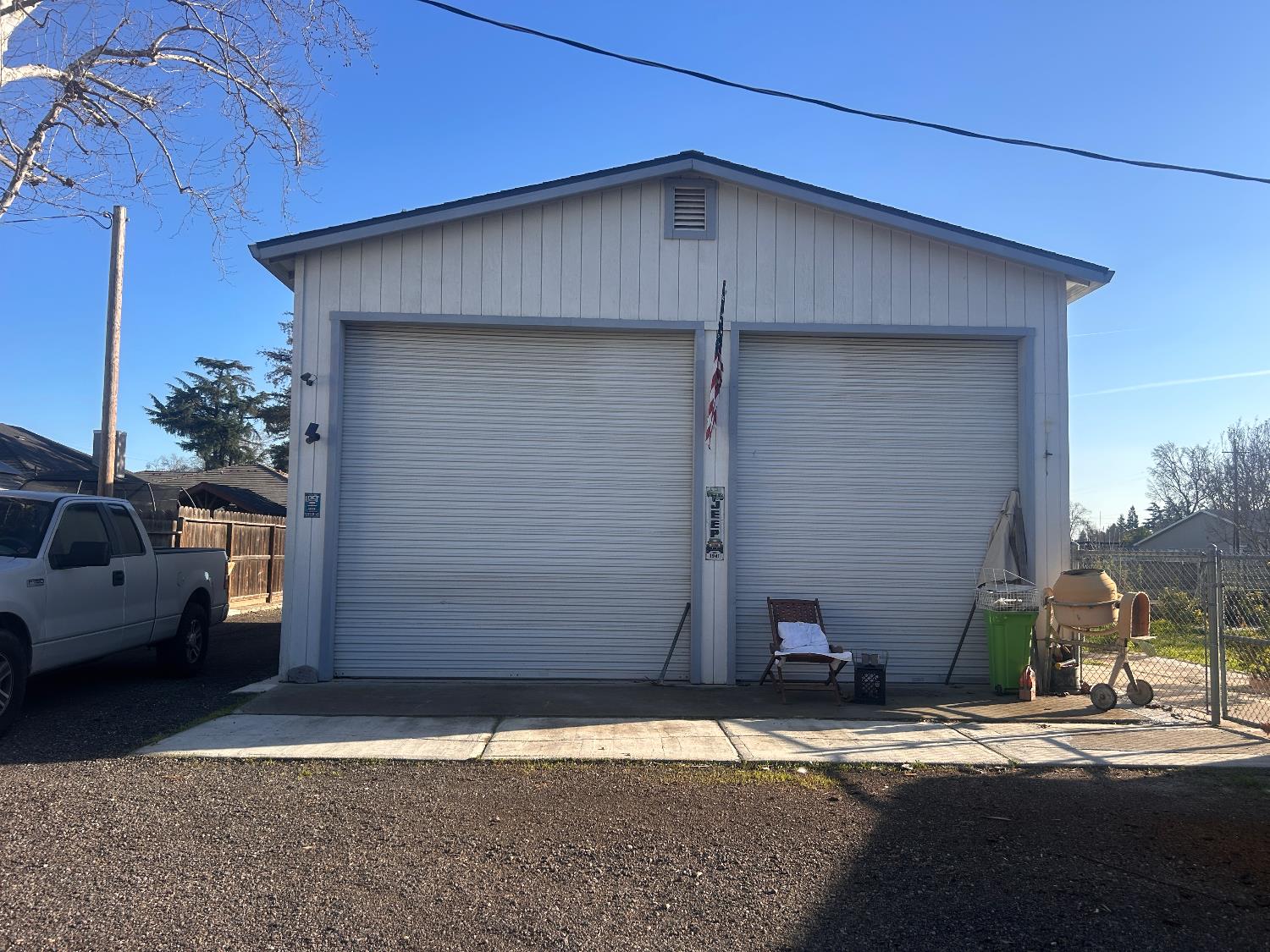 4910 East Zeering Road Denair, CA 95316 - Photo 2 of 11 a couple of potted plants in front of door