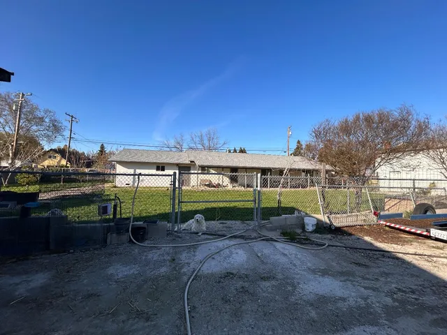 a terrace with outdoor seating and wooden floor