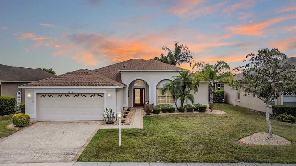 1536 Morning Rose Place Trinity, FL 34655 - Photo 1 of 1 a front view of a house with a yard