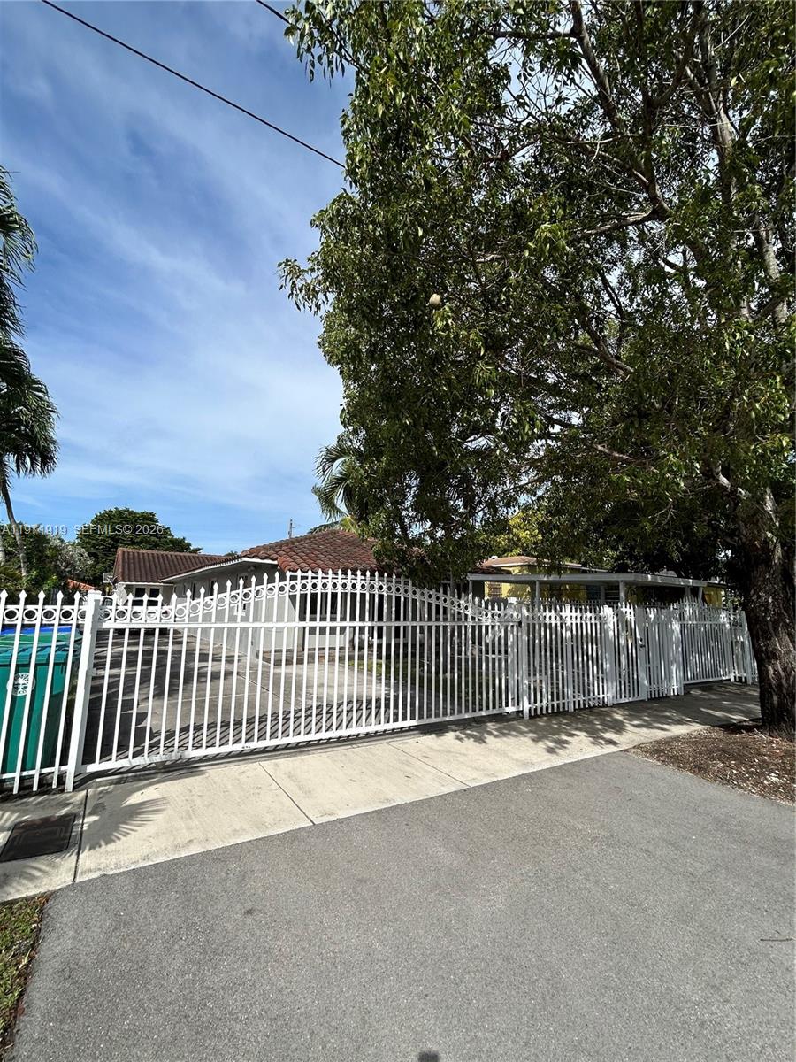 230 Southwest 30th Avenue, Unit 230 Miami, FL 33135 - Photo 22 of 22 a view of a balcony with a tree